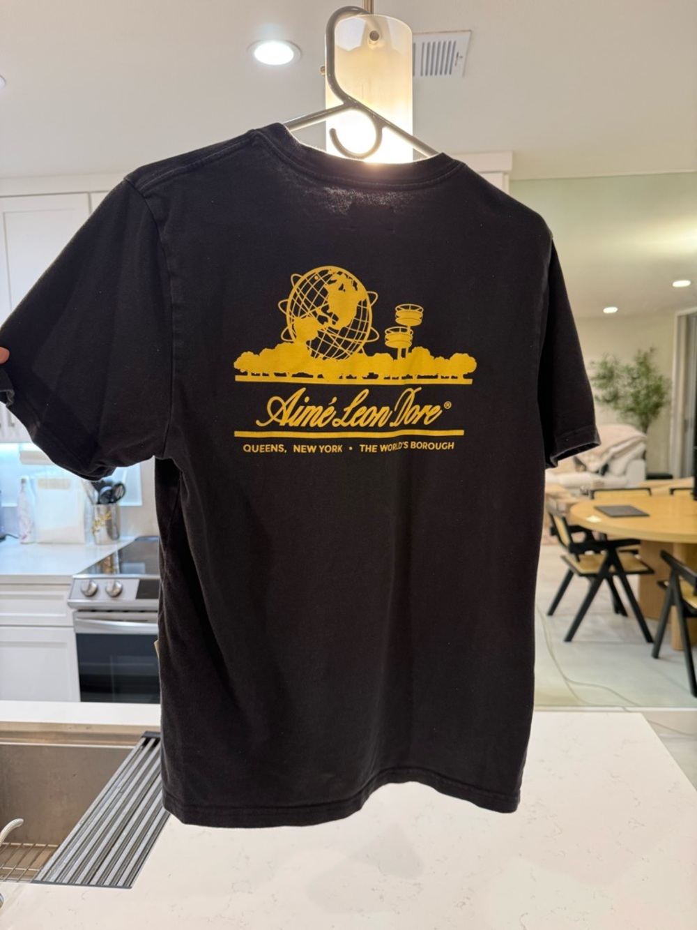 Aime Leon Dore Black Short Sleeve Tee with Yellow Globe Graphic